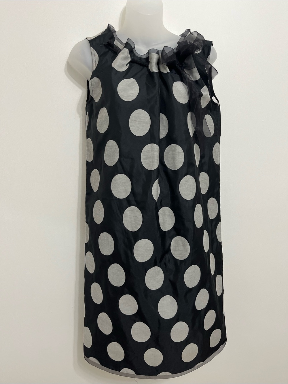 Sleeveless Black and White Polka Dot Formal Dress with Ruffle Neckline